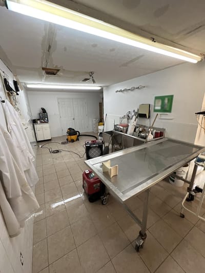 The funeral home prep room before the abatement began