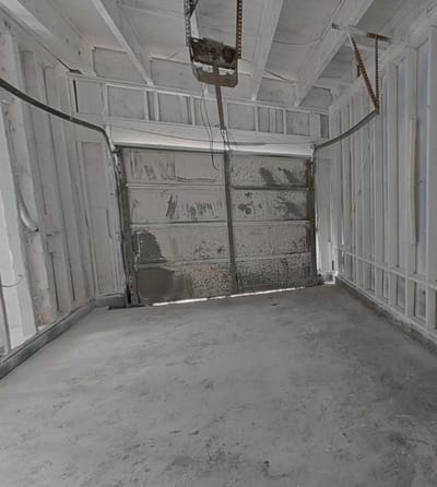 The same garage cleaned, sealed and ready for rebuild
