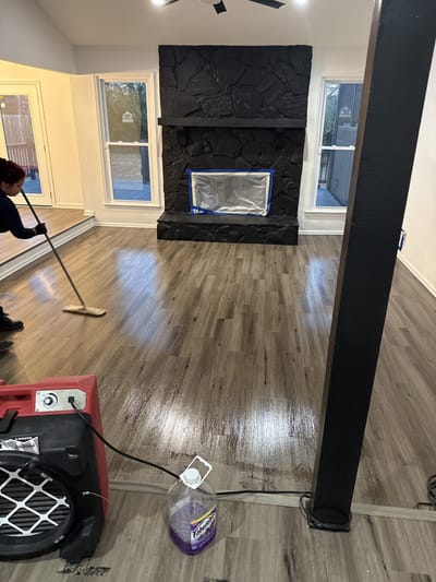Cleaning the upstairs living room as part of the whole-house cleaning