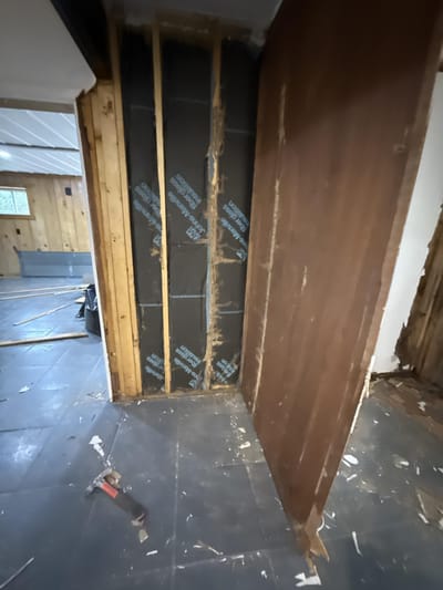 Old insulation and ceiling material left in place for asbestos sampling