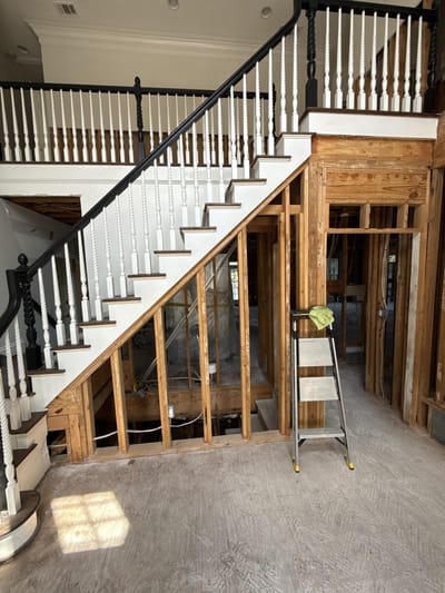 Cleaned and treated stairway after the water damage was removed