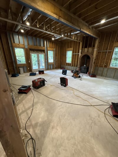 Drying equipment running in the basement to pull the structure back to dry standard